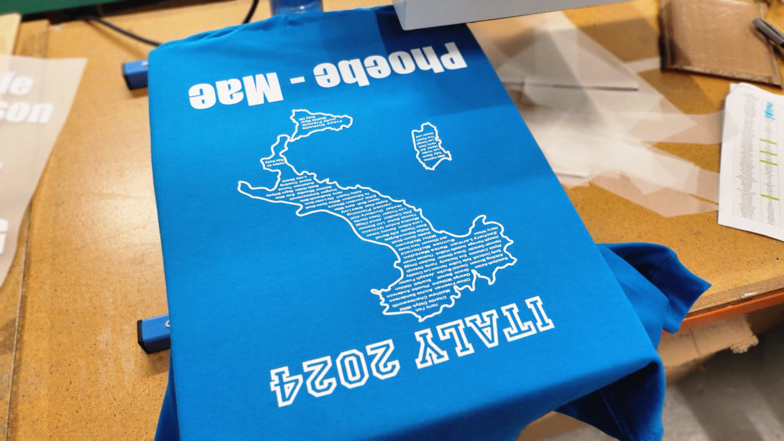 Decorated garment with outline of Italy containing pupils names