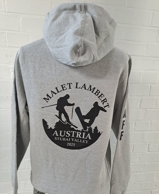 Skiing motif on the back of a grey hoodie