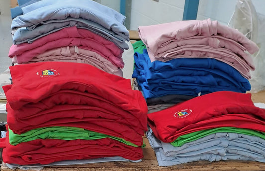 stacks-of-embroidered-clothing